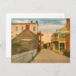 古いフレームハウスを持つ道路上 シーズンポストカード