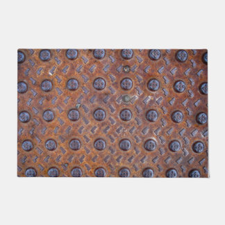 古いモントリオールのドア・マットの老化させた金属の火格子 ドアマット