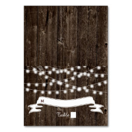 古い木材のエスコート結婚カードの灯列 テーブルナンバー
