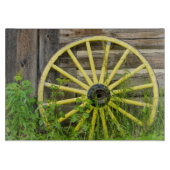 古い歴史的な古い金ゴールドの町を荷馬車の車輪 カッティングボード (正面)