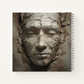 古い漆喰から突き出た人間の顔 ノートブック (裏面)