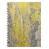 古い灰色のコンクリートの壁の剥離の黄色絵を描。 ノートブック (正面)