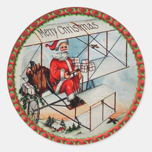 古い飛行機を飛ばすクリスマスサンタ ラウンドシール