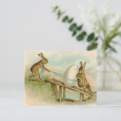 古く旧式なヴィンテージのハッピーイースターのウサギおよび卵 シーズンポストカード (スタンド正面)