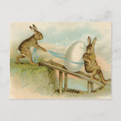 古く旧式なヴィンテージのハッピーイースターのウサギおよび卵 シーズンポストカード (正面)