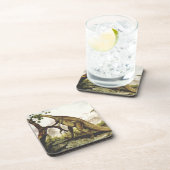 古代の恐竜、プレートオサウルスが木を食べる コースター (右側)