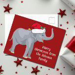 可愛いおもしろい赤いサンタ帽のクリスマスゾウ ポストカード<br><div class="desc">クリスマスは可愛い休日お気に入りのの動物が私の一部だ。赤いかわいらしサンタ帽をかぶった象が幸せそうに見える。これは私にクリスマス精神を満たす。このポストカードを自分の休暇メッセージでカスタマイズする。</div>