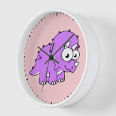 可愛いイラストレーションのトリケラトプス。 壁時計 (傾斜)