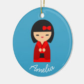 可愛いオレンジコケシ日本のの人形 セラミックオーナメント (左)