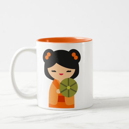 可愛いオレンジコケシ日本のの人形 ツートーンマグカップ (左)