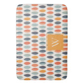 可愛いオレンジ色の青い葉の植物性モノグラムパターン バスマット (正面縦)