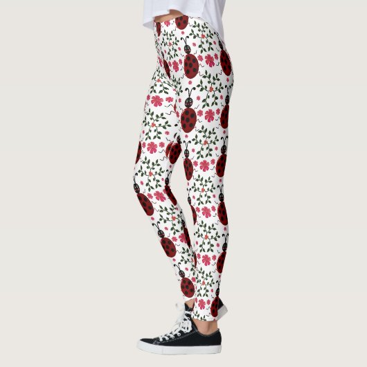 可愛いテントウムシの花柄シームレス パターン レギンス (左)