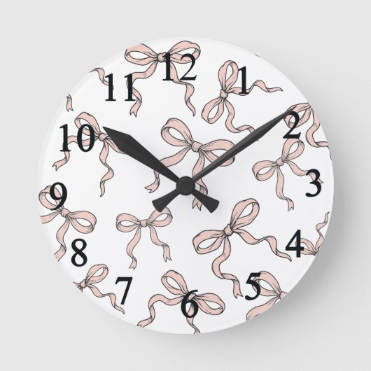 可愛いトレンディーピンクのリボン弓（黒で縁取り） ラウンド壁時計 (正面)
