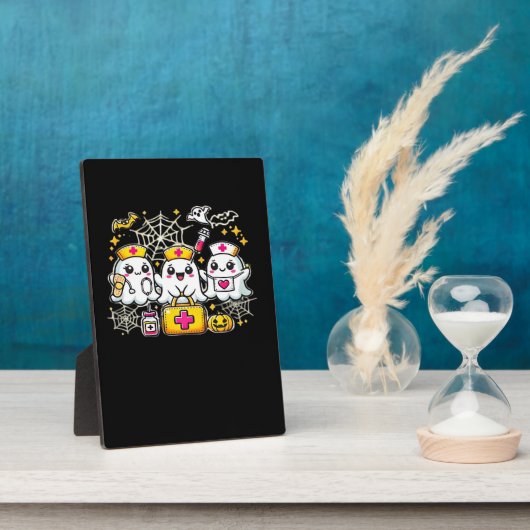 可愛いハロウィーン幽霊ナーストリオとメディカルキットa フォトプラーク (側面)