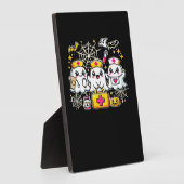 可愛いハロウィーン幽霊ナーストリオとメディカルキットa フォトプラーク (側面)