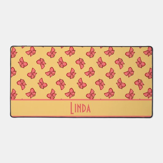 可愛いピンクの弓結び模様 デスクマット (正面)