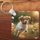 可愛い子犬が蝶を追いかける キーホルダー (正面)