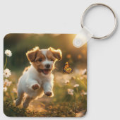 可愛い子犬が蝶を追いかける キーホルダー (裏面)