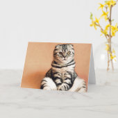 可愛い子猫が手足を伸ばした カード (黄色い花)