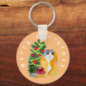 可愛い猫が心地よい毛布の下にお茶を入れて キーホルダー (正面)