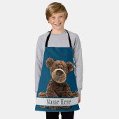 可愛い茶色のクマスタイリッシュの動物名青キッズ エプロン (着用した状態)