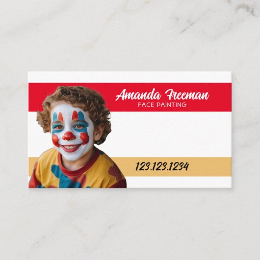 可愛い赤と黄色のピエロ絵を描顔画家 名刺 (正面)