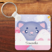 可愛お洒落い太陽に照らされた猫と冬の山 キーホルダー (正面)