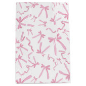 可愛かわいらしいピンクリボン弓パターンスワッグ ミディアムペーパーバッグ (正面)