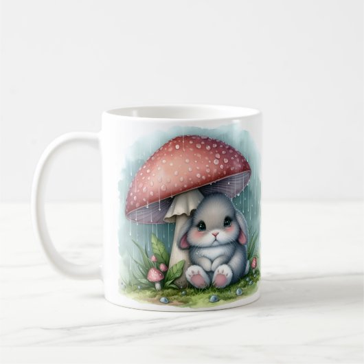 可愛らしいベビーウサギの傘の下 コーヒーマグカップ (左)