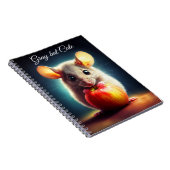 可愛らしい小さな齧歯動物が赤いリンゴを閉じて保持 ノートブック (右側)