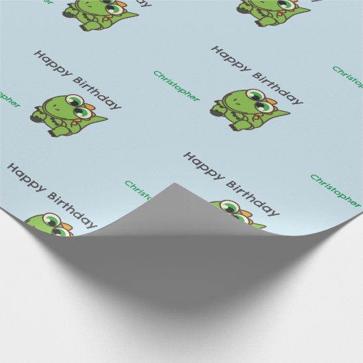 可愛パーソナライズされたい緑の恐竜の青い誕生日 ラッピングペーパー (角)