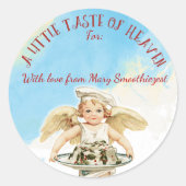 台所からの天使のシェフのクリスマスのケーキの ラウンドシール (正面)