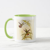 同カラフルじ花を目指すハチドリ二羽 マグカップ (左)