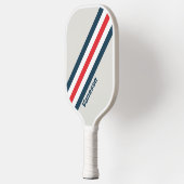 名前のストライプ付いたWarbirdの ピックルボールラケット (左)