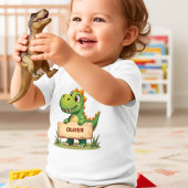 名前の記号がついたかわいいパーソナライズされた恐竜 ベビーTシャツ