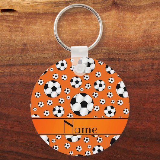 名前をカスタムするおもしろいオレンジサッカーボールオレンジストライプ色 キーホルダー (正面)