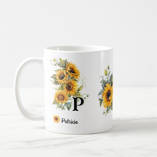 名前をカスタムするとイニシャルひまわり開花黄 コーヒーマグカップ (左)
