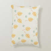 名前をカスタムするオレンジ色の熱帯葉性クリーム アクセントクッション (裏面(縦))