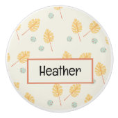 名前をカスタムするオレンジ色の熱帯葉性クリーム セラミックノブ (正面)