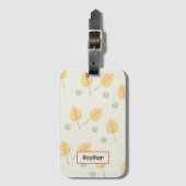 名前をカスタムするオレンジ色の熱帯葉性クリーム ラゲッジタグ (正面縦)