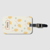 名前をカスタムするオレンジ色の熱帯葉性クリーム ラゲッジタグ (正面横)
