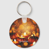 名前をカスタムする白熱［赤熱］光を放つカボチャ秋季《写真》ぼけ味効果 キーホルダー (正面)