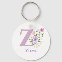 名前を持つフローラデザインのキーチェーンまたは鍵フォブ
