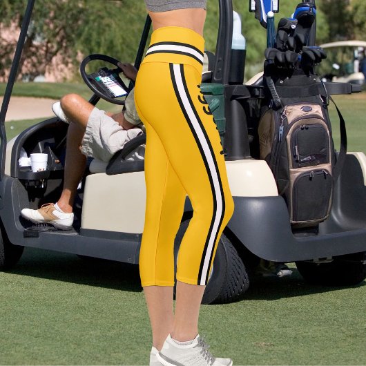 名前パーソナライズされたイエローオレンジ白黒ストライプ カプリレギンス