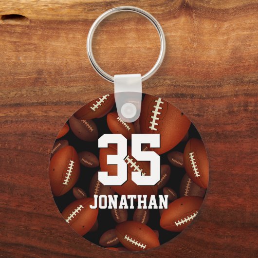名前パーソナライズされたジャージー番号とフットボール キーホルダー (正面)