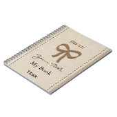 名前入りでかわいいベビーの女の子らしい女の子の金ゴールドの弓 ノートブック (左側)