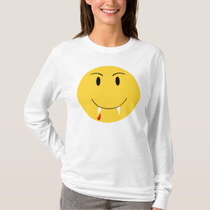 吸血鬼の牙のワイシャツが付いている黄色い顔 Tシャツ