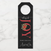 喜びの知らせ赤いクリスマスポインセチアの黒 ボトルネックタグ (正面)