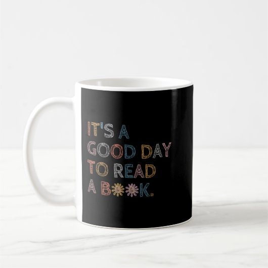 図書館のL読を予約すおもしろいる読いい日だ コーヒーマグカップ (左)