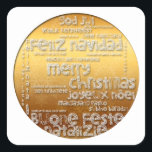 国際的Christmas Navidad Greeting Sシール スクエアシール<br><div class="desc">Wish Christmas in many languages : Feliz Navidad - Feliz Natal - Joyeux Noel - Frehliche Weihnachen - Vrolijk Kerstfeest - Buone Feste Natalizie - God Jul - Merry Christmas，ゴールデンの背景に切り取りスタイル(白レタリング)のような美しいい文字デザインをを付したクリスマス。デザインの白い背景の正方形のステッカー。簡単にサイズを変更できるデザイン。聖降誕祭忘れの挨拶の全国際的集を行うな。</div>